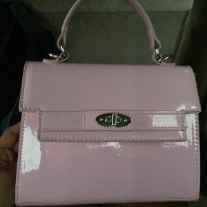 I am selling a pink MADDEN NYC purse